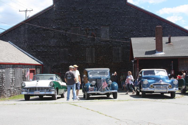 Classic cars parked in front of the main factory building at the Tremont Nail Factory District were entered in Tuesday's car show. BY MATTHEW BERNAT